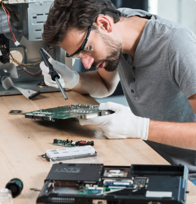 Technician performing industrial equipment repair and maintenance